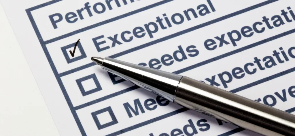 Performance evaluation checklist with 'Exceptional' checked off, representing the process of evaluating a medical record retrieval service.