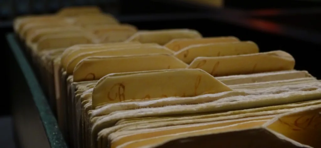 Close-up of aged medical record files